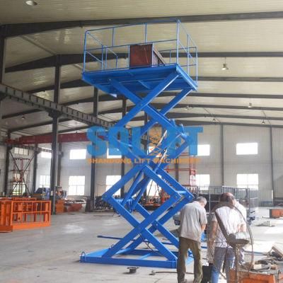Warehouse Uses a Small Hydraulic Scissor Lift Platform
