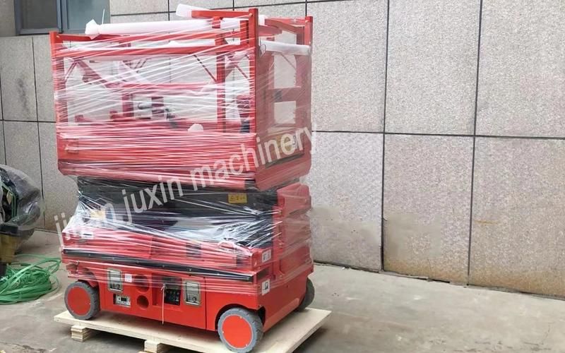 Jinan Juxin Hydraulic Lift Table Lifting Equipment Mobile Electric Scissor Lift