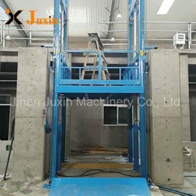 China Juxin 2 Floors Hydraulic Wall Mounted Vertical Cargo Lift Hoist